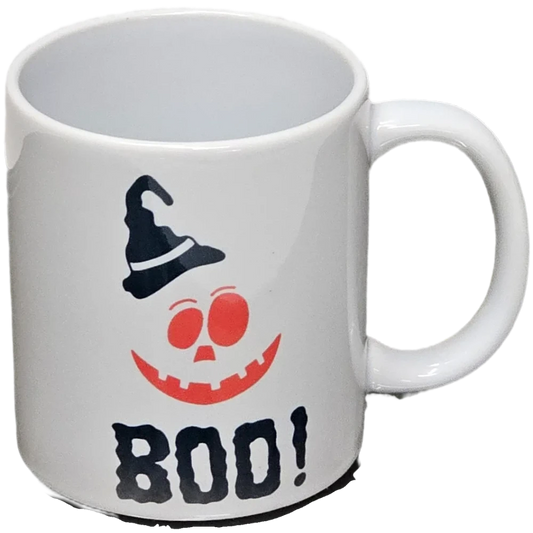 A festive mug featuring the word "Boo!" in a bold, playful design—perfect for adding a touch of Halloween spirit to your coffee or tea breaks.